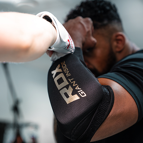 RDX Boxeo Brazo Protector Codo Antebrazo Protecciones Coderas Kickboxing Forearm Arm Sleeve